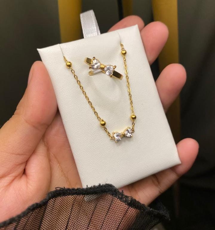 Stainless steel bow pendent with ring 