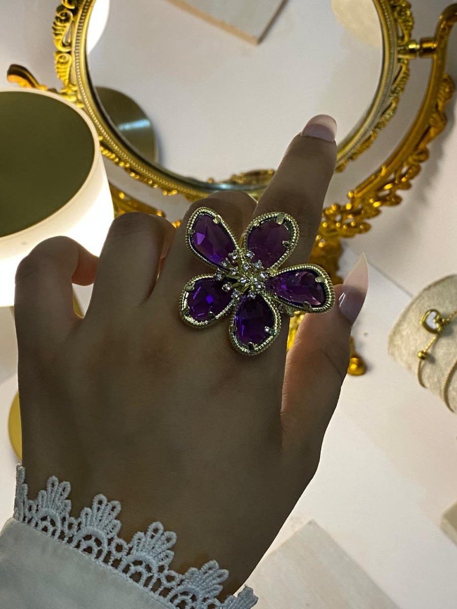 Crystal stone ring in purple colour 
